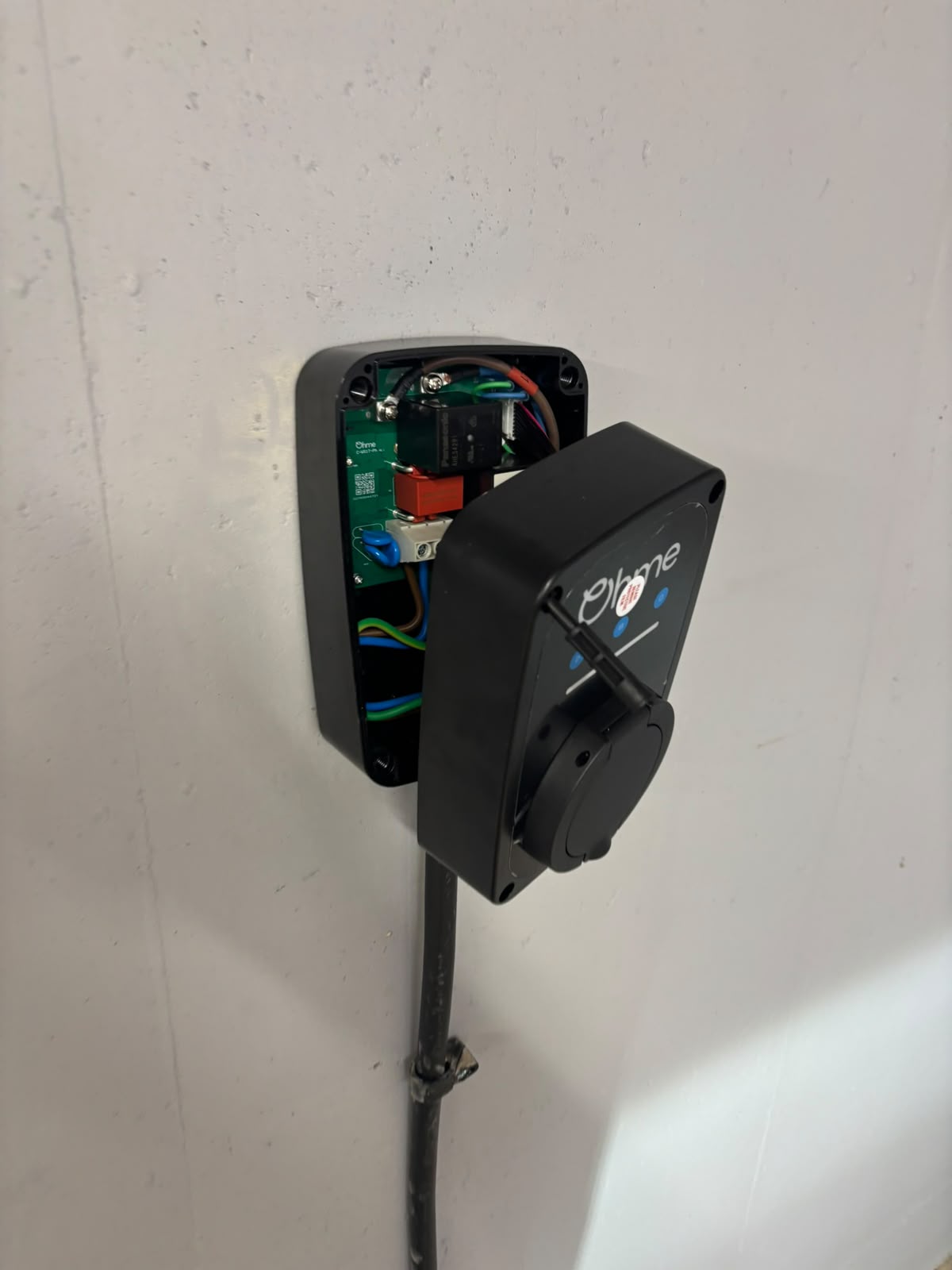 Ohme EV charger wired and commissioned by our NICEIC engineers