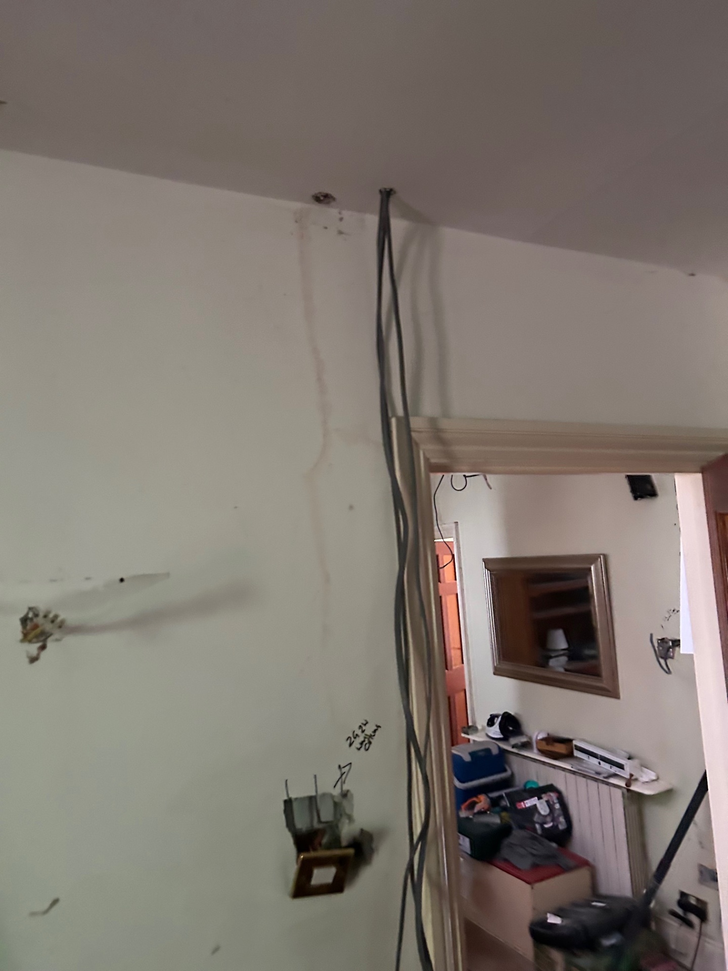 House rewire in progress with cables exposed