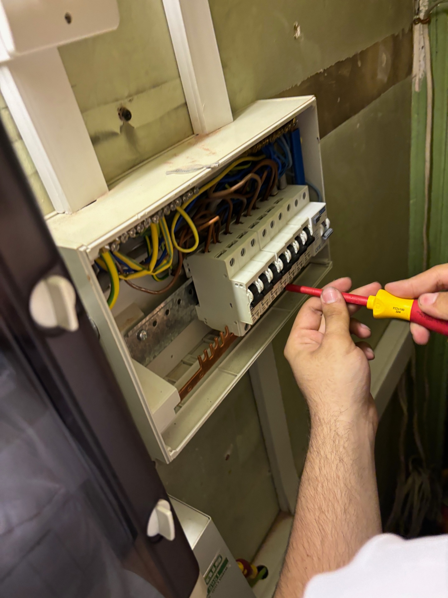 Old fuse box requiring professional upgrade